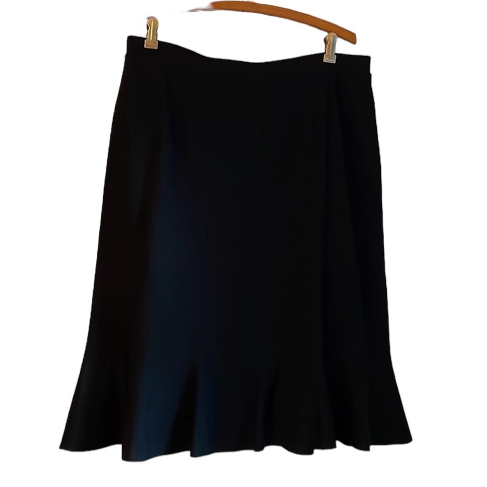 Black knit straight skirt with slight ruffle hem. Size L. EUC
